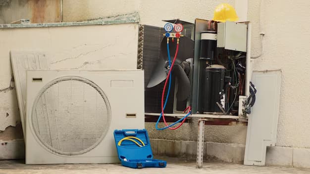 A blue case sitting next to an air conditioner.